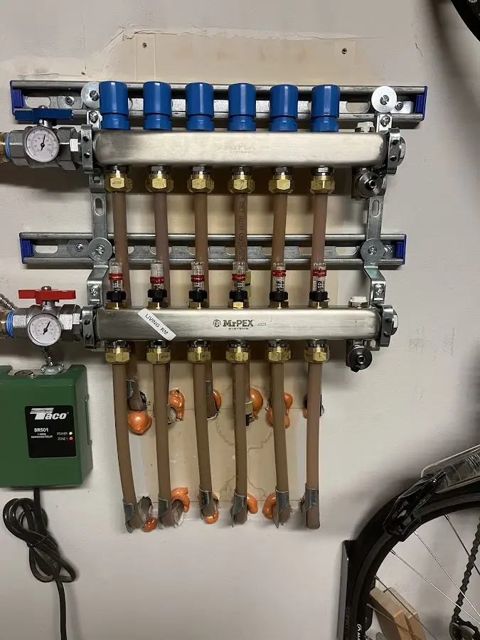 Plumber performing Gas Line Installation at a residential property in Kula